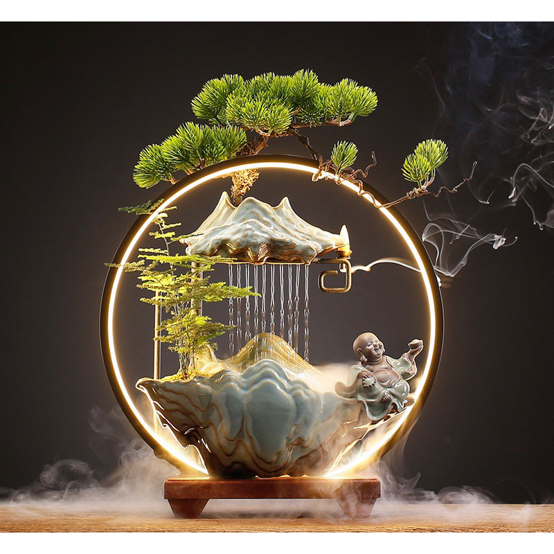 Feng shui waterfall - Tram smoke spreads back to the fountain