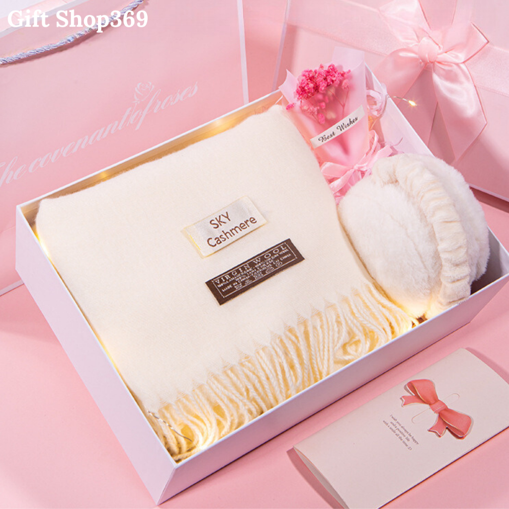 Set of warm winter gift boxes with towels, gloves, ears and flowers with lovers, close friends, girlfriends.