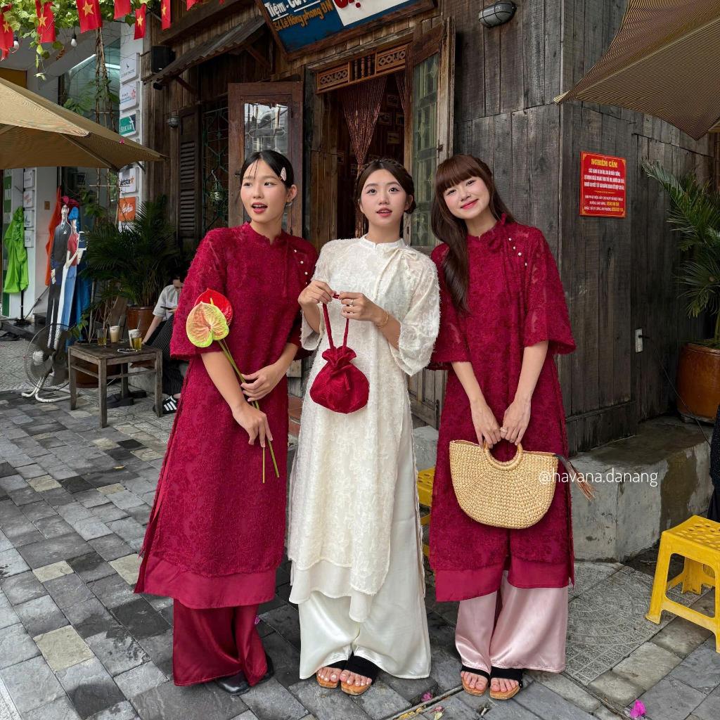 Yen Phuong feathered ao dai tied the stylized bow with Havana AD89 pants